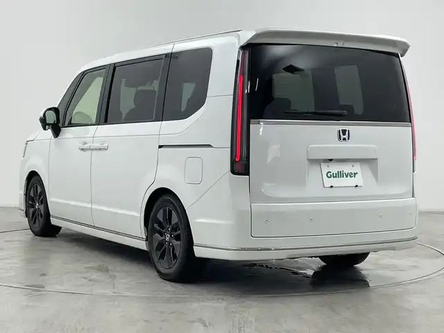 ホンダ ステップワゴン スパーダ eHEV 群馬県 2024(令6)年 0.5万km プラチナホワイトパール 純正１１．４型ナビ　純正１５．６型後席モニター　全周囲カメラ　ダウンサス　ハーフレザーシート　シートヒーター　前後ドラレコ　ＥＴＣ　アダプティブクルーズコントロール　両側電動スライドドア　禁煙車