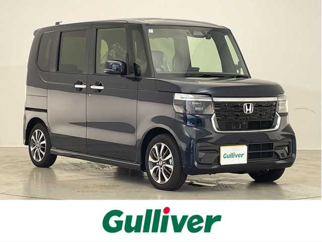 ホンダ Ｎ ＢＯＸ カスタム 滋賀県 2024(令6)年 0.1万km ミッドナイトブルービームM 禁煙車/純正9型ナビ/CD.DVD.Bluetooth.フルセグ.Applecarplay/バックカメラ/ホンダセンシング/●衝突軽減ブレーキ/●先行車発進お知らせ機能/●歩行者事故低減ステアリング/●路外逸脱抑制機能/●標識認識機能/●渋滞追従機能付アダプティブクルーズコントロール/●車線維持支援システム/●誤発進抑制機能/●後方誤発進抑制機能/●近距離衝突軽減ブレーキ/●急アクセル抑制機能/●パーキングセンサーシステム/●オートハイビーム/ビルトインETC/前席シートヒーター/LEDヘッドライト/片側電動スライドドア/前方ドライブレコーダー/パーキングセンサー/電子パーキング/ブレーキホールド