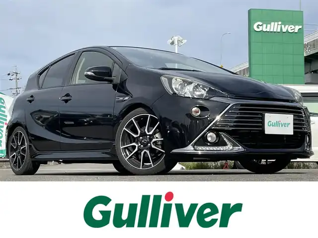 トヨタ アクア G G’s 愛知県 2014(平26)年 7.5万km ブラックマイカ 社外ＳＤナビ　/Ｂカメラ　/ＢＴ　/ＤＴＶ　/ＵＳＢ　/ＣＤ／ＤＶＤ　/ハーフレザー　/革ハンドル　/ＬＥＤヘッドライト　/プッシュスタート　/ステアリングスイッチ　/前席シートヒーター　/純正１７インチＡＷ