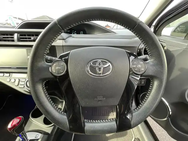 トヨタ アクア G G’s 愛知県 2014(平26)年 7.5万km ブラックマイカ 社外ＳＤナビ　/Ｂカメラ　/ＢＴ　/ＤＴＶ　/ＵＳＢ　/ＣＤ／ＤＶＤ　/ハーフレザー　/革ハンドル　/ＬＥＤヘッドライト　/プッシュスタート　/ステアリングスイッチ　/前席シートヒーター　/純正１７インチＡＷ
