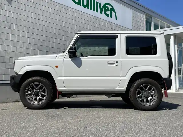 スズキ ジムニー XC 山形県 2022(令4)年 6.6万km ピュアホワイトP 4WD/社外SDナビ/フルセグTV/AM/FM/CD/DVD/Bluetooth/禁煙車/衝突軽減ブレーキ/クルーズコントロール/レーンキープアシスト/オートライト/横滑り防止装置/盗難防止装置/ターボ/ETC/プッシュスタート/スマートキー/シートヒーター/LEDヘッドライト/５MT/オートライト /フォグランプ/背面タイヤ/純正アルミ/ドアバイザー/保証書/取扱説明書