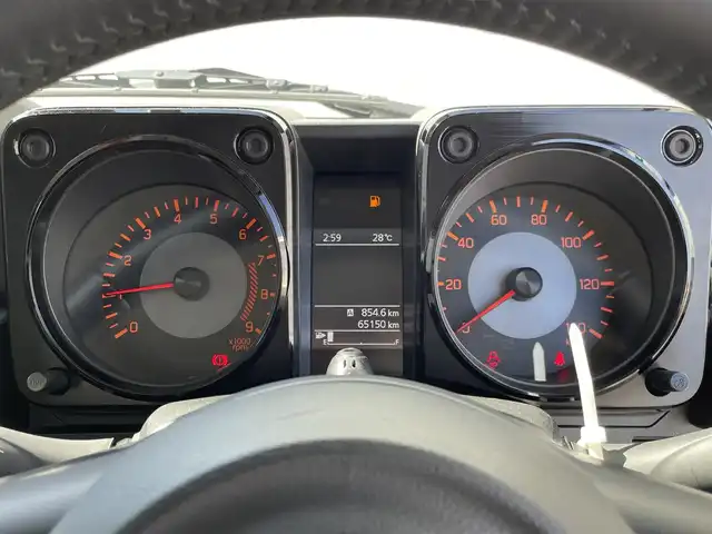 スズキ ジムニー XC 山形県 2022(令4)年 6.6万km ピュアホワイトP 4WD/社外SDナビ/フルセグTV/AM/FM/CD/DVD/Bluetooth/禁煙車/衝突軽減ブレーキ/クルーズコントロール/レーンキープアシスト/オートライト/横滑り防止装置/盗難防止装置/ターボ/ETC/プッシュスタート/スマートキー/シートヒーター/LEDヘッドライト/５MT/オートライト /フォグランプ/背面タイヤ/純正アルミ/ドアバイザー/保証書/取扱説明書