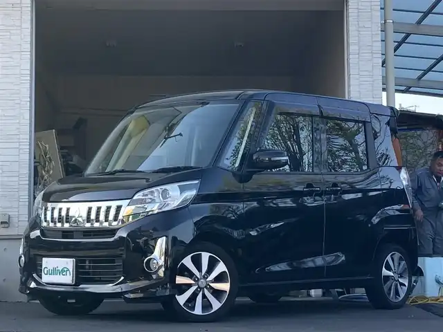 三菱 ｅＫスペース カスタムT 大分県 2015(平27)年 10万km アメジストブラック 両側パワースライドドア/純正15インチアルミホイール/純正LEDヘッドライト/オートライト/フォグランプ/社外フロアマット/社外ETC/リアサーキュレーター/革巻きステアリング/盗難防止装置/横滑り防止装置/バックカメラ/スマートキー/5月3日から5月7日までお休みの為、書類発送及び車両搬出は5月8日以降になります。