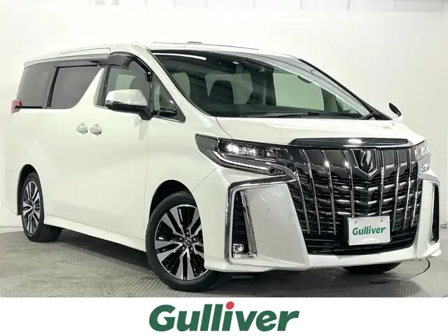 トヨタ アルファード S Cパッケージ 大阪府 2023(令5)年 0.9万km ホワイトパールクリスタルシャイン ツインムーンルーフ　純正フリップダウンモニター　ディスプレイオーディオ　３眼ＬＥＤヘッドライト　両側電動ドア　ＡＣ１００Ｖ　バックカメラ　ビルトインＥＴＣ　メモリシート　ドラレコ　ハンドルヒーター
