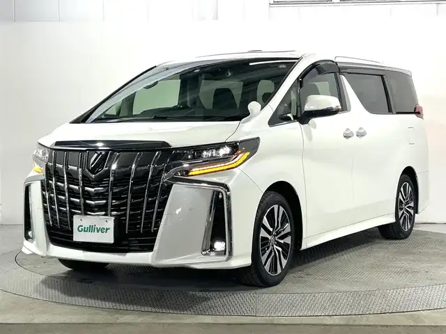 トヨタ アルファード S Cパッケージ 大阪府 2023(令5)年 0.9万km ホワイトパールクリスタルシャイン ツインムーンルーフ　純正フリップダウンモニター　ディスプレイオーディオ　３眼ＬＥＤヘッドライト　両側電動ドア　ＡＣ１００Ｖ　バックカメラ　ビルトインＥＴＣ　メモリシート　ドラレコ　ハンドルヒーター