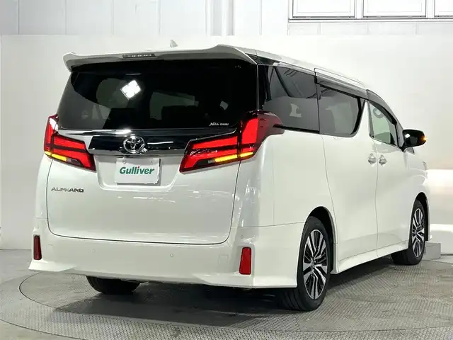 トヨタ アルファード S Cパッケージ 大阪府 2023(令5)年 0.9万km ホワイトパールクリスタルシャイン ツインムーンルーフ　純正フリップダウンモニター　ディスプレイオーディオ　３眼ＬＥＤヘッドライト　両側電動ドア　ＡＣ１００Ｖ　バックカメラ　ビルトインＥＴＣ　メモリシート　ドラレコ　ハンドルヒーター