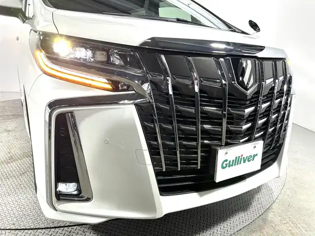 トヨタ アルファード S Cパッケージ 大阪府 2023(令5)年 0.9万km ホワイトパールクリスタルシャイン ツインムーンルーフ　純正フリップダウンモニター　ディスプレイオーディオ　３眼ＬＥＤヘッドライト　両側電動ドア　ＡＣ１００Ｖ　バックカメラ　ビルトインＥＴＣ　メモリシート　ドラレコ　ハンドルヒーター