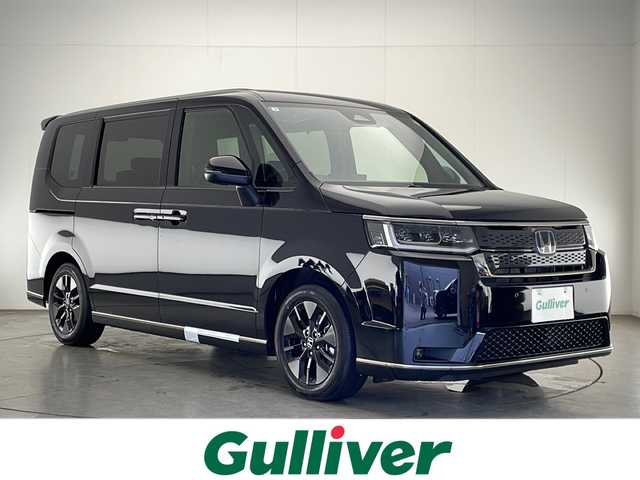 ホンダ ステップワゴン スパーダ eHEV 宮崎県 2025(令7)年 0.1万km未満 クリスタルブラックパール 登録済み未使用車/ホンダセンシング/純正11.4型ディスプレイオーディオナビTV/（Honda CONNECT/LXM-247VFLi/Bluetooth/USB/HDMI/フルセグTV)/純正バックカメラ/純正LEDオートライト/純正LEDフォグ/純正16インチアルミ/純正エアロ/純正ルーフエンドスポイラー/両側電動スライドドア/アダプティブクルーズコントロール/レーンディパーチャーアラート/クリアランスソナー/ブラインドスポットモニター/パドルシフト/電子パーキング/オートホールド/Wオートエアコン/ハーフレザーシート/前席シートヒーター/パワーバックドア/スマートキー/プッシュエンジンスタート/スペアキー/新車時保証書/取扱い説明書