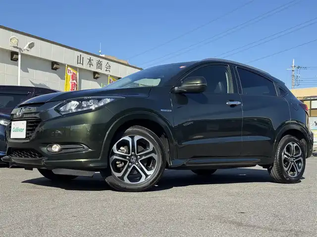 ホンダ ヴェゼル ハイブリッド Z 千葉県 2014(平26)年 4.3万km ミスティックグリーンパール ワンオーナー車/あんしんパッケージ/コンフォートビューパッケージ/純正ナビ/ワンセグTV/Bluetooth/バックカメラ/ハーフレザーシート/D/N席シートヒーター/純正17インチAW/LEDライト/ETC/保証書・取説/スペアキー