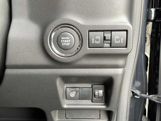 スズキ スペーシア カスタム HYBRID XS 山口県 2023(令5)年 0.1万km ブルーイッシュブラックパール3 両側パワースライドドア/プッシュスタート/スマートキー（スペアキー有）/シートヒーター（運転席＋助手席）/ステアリングヒーター/ヘッドアップディスプレイ/USB入力端子×２/オートエアコン/オートライト/LEDヘッドライト/フォグライト/サーキュレーター/アームレストコンソールボックス/助手席シートアンダーボックス/電動格納ミラー/スズキセーフティサポート/・デュアルセンサーブレーキサポート/・誤発進抑制機能/・車線逸脱抑制機能/・ふらつき警報/・車線維持支援機能/・発進お知らせ機能/・標識認識機能/・アダプティブクルーズコントロール/・低速時ブレーキサポート/・後方誤発進抑制機能