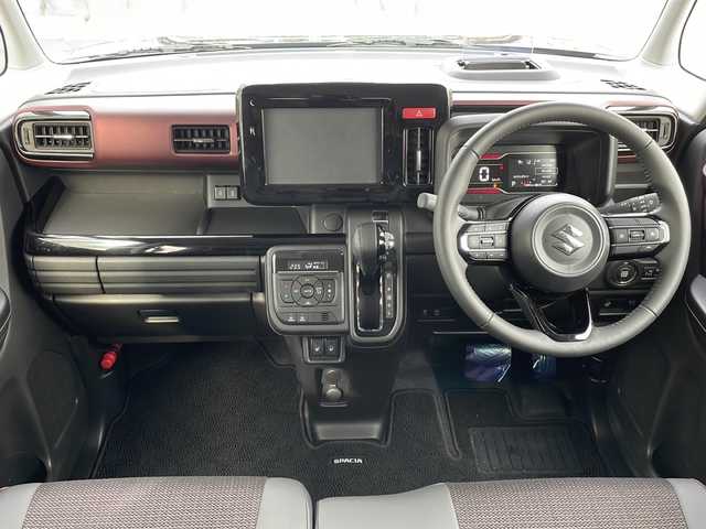 スズキ スペーシア カスタム HYBRID XS 山口県 2023(令5)年 0.1万km ブルーイッシュブラックパール3 両側パワースライドドア/プッシュスタート/スマートキー（スペアキー有）/シートヒーター（運転席＋助手席）/ステアリングヒーター/ヘッドアップディスプレイ/USB入力端子×２/オートエアコン/オートライト/LEDヘッドライト/フォグライト/サーキュレーター/アームレストコンソールボックス/助手席シートアンダーボックス/電動格納ミラー/スズキセーフティサポート/・デュアルセンサーブレーキサポート/・誤発進抑制機能/・車線逸脱抑制機能/・ふらつき警報/・車線維持支援機能/・発進お知らせ機能/・標識認識機能/・アダプティブクルーズコントロール/・低速時ブレーキサポート/・後方誤発進抑制機能