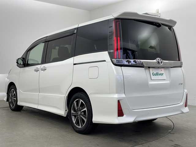 トヨタ ノア Si ダブルバイビーⅢ 兵庫県 2021(令3)年 1.6万km ホワイトパールクリスタルシャイン ・純正10インチナビ&TV&CD&SD&BT/・トヨタセーフティセンス　/・プリクラッシュセーフティ/・レーンキープアシスト/・オートマチックハイビーム/・クルーズコントロール/・両側パワースライドドア/・純正リアフリップダウンモニター　/・前後ドライブレコーダー/・ビルトインＥＴＣ　/・バックカメラ　/・前後コーナーセンサー/・ハーフレザーシート/・アイドリングストップ　/・LEDオートライト　/・LEDフォグランプ　/・純正１６インチアルミホイール
