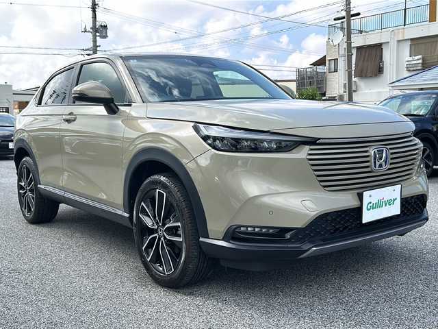 ホンダ ヴェゼル ハイブリッド 沖縄県 2021(令3)年 2.4万km サンドカーキパール ホンダセンシング/純正９型ナビ/ＡＭ／ＦＭ／ＣＤ／ＤＶＤ／ＢＴ/フルセグＴＶ/バックモニター/衝突軽減/クルコン/コーナーセンサー/オートライト/ＥＴＣ/純正１８ＡＷ/ドラレコ