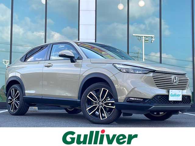 ホンダ ヴェゼル ハイブリッド e:HEV X 福岡県 2021(令3)年 2.4万km サンドカーキパール ホンダセンシング/純正９型ナビ/Bluetooth/CD/DVD/フルセグTV/バックモニター/追従クルーズコントロール/コーナーセンサー/ドライブレコーダー/ビルトインETC/純正LEDヘッドライト/オートライト/純正１８インチアルミホイール/フォグランプ/純正フロアマット/スマートキー/プッシュスタート