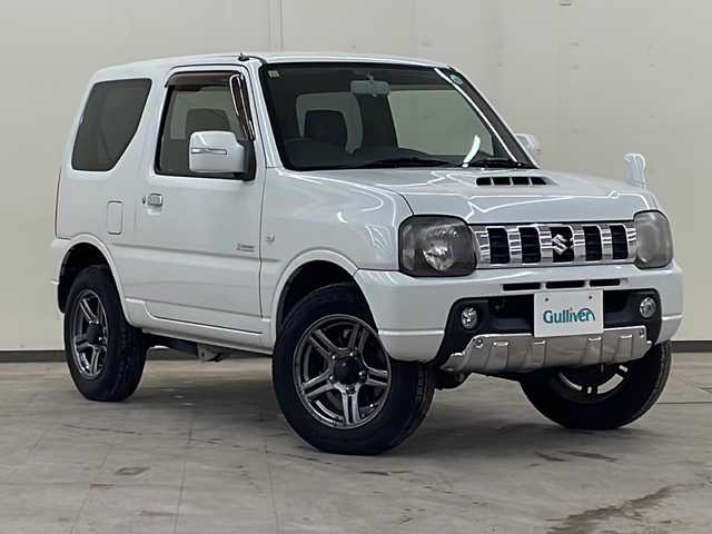 スズキ ジムニー クロスアドベンチャー 道央・札幌 2012(平24)年 8.5万km パールホワイト /切り替え4WD//5速マニュアル//社外オーディオ//寒冷地仕様//スペアタイヤ//ETC//リモコンキー//運転席シートヒーター//ミラーヒーター//純正アルミホイール//電動格納ミラー