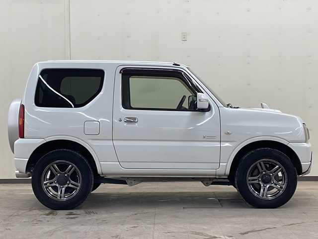 スズキ ジムニー クロスアドベンチャー 道央・札幌 2012(平24)年 8.5万km パールホワイト /切り替え4WD//5速マニュアル//社外オーディオ//寒冷地仕様//スペアタイヤ//ETC//リモコンキー//運転席シートヒーター//ミラーヒーター//純正アルミホイール//電動格納ミラー