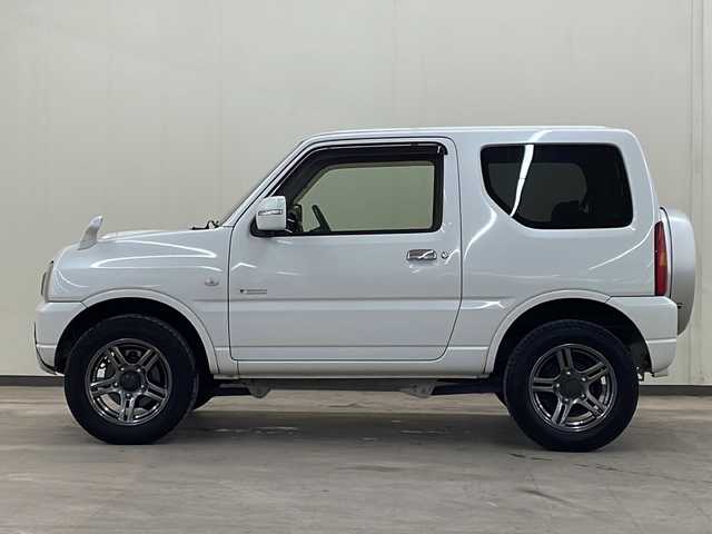 スズキ ジムニー クロスアドベンチャー 道央・札幌 2012(平24)年 8.5万km パールホワイト /切り替え4WD//5速マニュアル//社外オーディオ//寒冷地仕様//スペアタイヤ//ETC//リモコンキー//運転席シートヒーター//ミラーヒーター//純正アルミホイール//電動格納ミラー