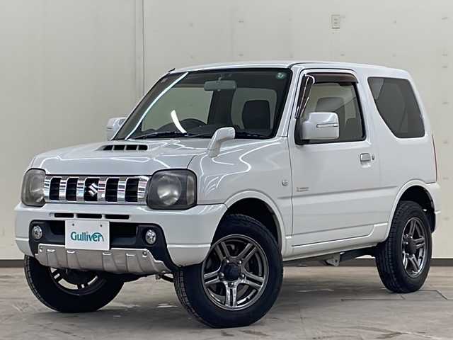 スズキ ジムニー クロスアドベンチャー 道央・札幌 2012(平24)年 8.5万km パールホワイト /切り替え4WD//5速マニュアル//社外オーディオ//寒冷地仕様//スペアタイヤ//ETC//リモコンキー//運転席シートヒーター//ミラーヒーター//純正アルミホイール//電動格納ミラー