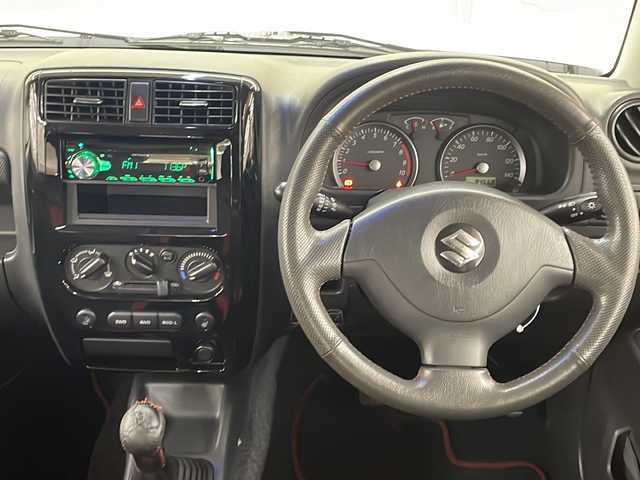 スズキ ジムニー クロスアドベンチャー 道央・札幌 2012(平24)年 8.5万km パールホワイト /切り替え4WD//5速マニュアル//社外オーディオ//寒冷地仕様//スペアタイヤ//ETC//リモコンキー//運転席シートヒーター//ミラーヒーター//純正アルミホイール//電動格納ミラー