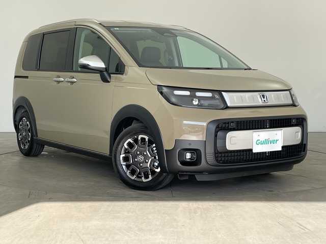 ホンダ フリード ハイブリット e:HEV クロスター 兵庫県 2025(令7)年 0.1千km ベージュ ・登録済未使用車/・衝突軽減ブレーキ/・路外逸脱抑制機能/・踏み間違い衝突軽減システム/・オートハイビーム/・アダプティブクルーズコントロール/・コーナーセンサー/・先行車発進告知/・BSM/・純正9インチナビ＆フルセグ＆BT＆USB/・バックカメラ/・両側パワースライドドア/・ハーフレザーシート/・前席シートヒーター/・LEDヘッドライト/・フォグ/・オートライト/・スマートキー/・スペアキー/・プッシュスタート/・2列目サーキュレーター/・2列目サンシェード