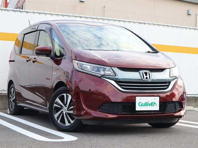 ホンダ フリードハイブリッド ハイブリッド ｇホンダセンシング ナビ後方カメラetc両側パワースライドア 16年式 平成28年式 プレミアムディープロッソパール Id 中古車検索のガリバー