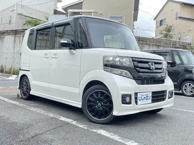 ホンダ Ｎ ＢＯＸ 2トーン カスタム G ターボLパッケージ 福岡県 2015(平27)年 8.6万km プレミアムホワイトパールⅡ (株)IDOMが運営する【じしゃロン八幡西店】の自社ローン専用車両になります。こちらは現金またはオートローンご利用時の価格です。自社ローンご希望の方は別途その旨お申付けください/純正SDナビ【VXM-165VFEi】/　（純正SDナビ・Bluetooth・DVD・CD・AM/FM)/バックカメラ/ステアリングスイッチ/ETC/クルーズコントロール/シティブレーキアクティブシステム/横滑り防止装置/両側パワースライドドア/ハーフレザーシート/電動格納ウィンカーミラー/ISOFIX/オートライト/純正HIDヘッドライト/純正フロアマット/純正15インチアルミホイール