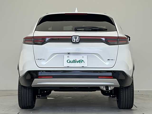 ホンダ ヴェゼル ハイブリッド e:HEV Z 愛知県 2025(令7)年 0.1万km未満 プラチナホワイトパール 登録済未使用車/衝突被害軽減ブレーキ/純正9インチディスプレイオーディオナビ（あり）/レーダークルーズコントロール/シートヒーター/フルセグTV/Bluetooth/バックカメラ/電動リアゲート/コーナーセンサー/純正アルミホイール/ETC2.0/ブラインドスポットモニター/LEDヘッドライト/パドルシフト/ステアリングヒーター/ダウンヒルアシストコントロール/オートマチックハイビーム/置くだけ充電器/ステアリングスイッチ/スマートキー/プッシュスタート
