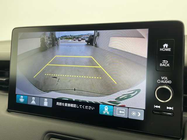 ホンダ ヴェゼル ハイブリッド e:HEV Z 愛知県 2025(令7)年 0.1万km未満 プラチナホワイトパール 登録済未使用車/衝突被害軽減ブレーキ/純正9インチディスプレイオーディオナビ（あり）/レーダークルーズコントロール/シートヒーター/フルセグTV/Bluetooth/バックカメラ/電動リアゲート/コーナーセンサー/純正アルミホイール/ETC2.0/ブラインドスポットモニター/LEDヘッドライト/パドルシフト/ステアリングヒーター/ダウンヒルアシストコントロール/オートマチックハイビーム/置くだけ充電器/ステアリングスイッチ/スマートキー/プッシュスタート