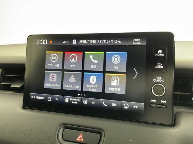 ホンダ ヴェゼル ハイブリッド e:HEV Z 茨城県 2025(令7)年 0.1千km クリスタルブラックパール 登録済未使用車/純正ディスプレイオーディオ/ナビキット有/フルセグ再生可/バックモニター/電動リアゲート/ステアリングヒーター/ワイヤレス充電器/Honda SENSING/・衝突軽減ブレーキ/・誤発進抑制機能/・後方誤発進抑制機能/・路外逸脱抑制機能/・渋滞追従機能付アダプティブクルーズコントロール/・車線維持支援システム/・トラフィックジャムアシスト/・先行車発進お知らせ機能、/・標識認識機能/・オートハイビーム/・パーキングセンサーシステム/・ブラインドスポットモニター/LEDヘッドライト/純正18インチAW/純正ビルトインETC2.0