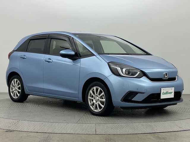 ホンダ フィット e:HEVホーム 新潟県 2020(令2)年 3.6万km ライトブルー 純正ナビ/　　フルセグ/CD/DVD/BT/バックカメラ/レーダークルーズ/LEDオートライト/アルミホイール付きスタッドレスタイヤ車載/ステアリングスイッチ/スマートキー/ETC