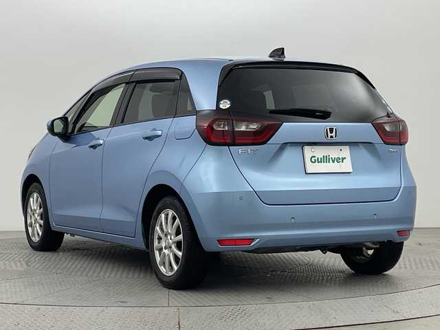 ホンダ フィット e:HEVホーム 新潟県 2020(令2)年 3.6万km ライトブルー 純正ナビ/　　フルセグ/CD/DVD/BT/バックカメラ/レーダークルーズ/LEDオートライト/アルミホイール付きスタッドレスタイヤ車載/ステアリングスイッチ/スマートキー/ETC