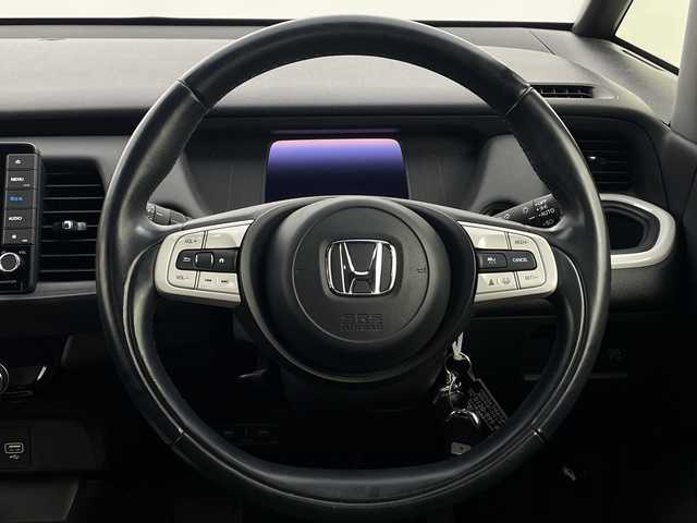 ホンダ フィット e:HEVホーム 新潟県 2020(令2)年 3.6万km ライトブルー 純正ナビ/　　フルセグ/CD/DVD/BT/バックカメラ/レーダークルーズ/LEDオートライト/アルミホイール付きスタッドレスタイヤ車載/ステアリングスイッチ/スマートキー/ETC