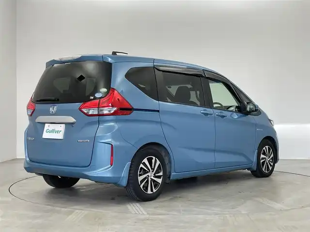 ホンダ フリード ハイブリット G ホンダセンシング 埼玉県 2017(平29)年 3.1万km ブルーホライゾンM 純正SDナビ【VXM-185VFNi】/(DVD/フルセグTV/Bluetooth/USB/MSV)/バックカメラ/両側パワースライドドア/ハーフレザーシート/ホンダセンシング/・CMBS（衝突軽減ブレーキ）/・歩行者事故低減ステアリング/・アダプティブクルーズコントロール/・LKAS（車線維持支援システム）/・路外逸脱抑制機能/・誤発進抑制機能/・先行車発進お知らせ機能/・標識認識機能/純正15インチアルミホイール/LEDヘッドライト/スマートキー/ビルトインETC/前方ドライブレコーダー/横滑り防止機能/カーテンエアバック