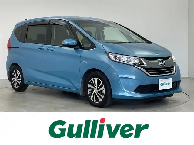ホンダ フリード ハイブリット G ホンダセンシング 埼玉県 2017(平29)年 3.1万km ブルーホライゾンM 純正SDナビ【VXM-185VFNi】/(DVD/フルセグTV/Bluetooth/USB/MSV)/バックカメラ/両側パワースライドドア/ハーフレザーシート/ホンダセンシング/・CMBS（衝突軽減ブレーキ）/・歩行者事故低減ステアリング/・アダプティブクルーズコントロール/・LKAS（車線維持支援システム）/・路外逸脱抑制機能/・誤発進抑制機能/・先行車発進お知らせ機能/・標識認識機能/純正15インチアルミホイール/LEDヘッドライト/スマートキー/ビルトインETC/前方ドライブレコーダー/横滑り防止機能/カーテンエアバック