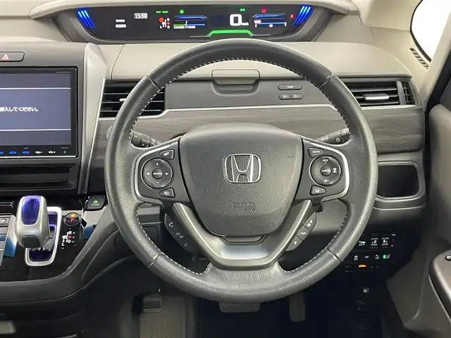 ホンダ フリード ハイブリット G ホンダセンシング 埼玉県 2017(平29)年 3.1万km ブルーホライゾンM 純正SDナビ【VXM-185VFNi】/(DVD/フルセグTV/Bluetooth/USB/MSV)/バックカメラ/両側パワースライドドア/ハーフレザーシート/ホンダセンシング/・CMBS（衝突軽減ブレーキ）/・歩行者事故低減ステアリング/・アダプティブクルーズコントロール/・LKAS（車線維持支援システム）/・路外逸脱抑制機能/・誤発進抑制機能/・先行車発進お知らせ機能/・標識認識機能/純正15インチアルミホイール/LEDヘッドライト/スマートキー/ビルトインETC/前方ドライブレコーダー/横滑り防止機能/カーテンエアバック