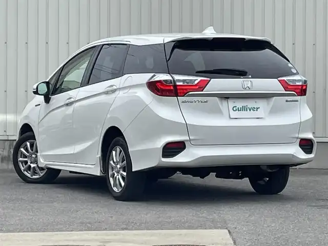 ホンダ シャトル ハイブリッド X スタイルED 山形県 2016(平28)年 9.7万km ホワイトオーキッドパール ４WD/CTBA/純正SDナビ/　　【CD　BT　ワンセグ　USB　AUX】/バックカメラ/クルーズコントロール/LEDオートライト/フォグランプ/ハーフレザーシート/15インチアルミホイール/ステアリングスイッチ/アイドリングストップ/パドルシフト/純正フロアマット/カーテンエアバック/スマートキー/ETC