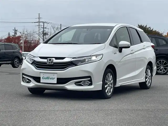 ホンダ シャトル ハイブリッド X スタイルED 山形県 2016(平28)年 9.7万km ホワイトオーキッドパール ４WD/CTBA/純正SDナビ/　　【CD　BT　ワンセグ　USB　AUX】/バックカメラ/クルーズコントロール/LEDオートライト/フォグランプ/ハーフレザーシート/15インチアルミホイール/ステアリングスイッチ/アイドリングストップ/パドルシフト/純正フロアマット/カーテンエアバック/スマートキー/ETC