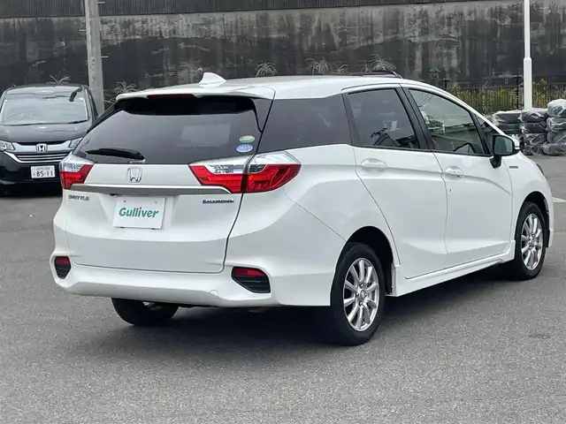 ホンダ シャトル ハイブリッド X スタイルED 山形県 2016(平28)年 9.7万km ホワイトオーキッドパール ４WD/CTBA/純正SDナビ/　　【CD　BT　ワンセグ　USB　AUX】/バックカメラ/クルーズコントロール/LEDオートライト/フォグランプ/ハーフレザーシート/15インチアルミホイール/ステアリングスイッチ/アイドリングストップ/パドルシフト/純正フロアマット/カーテンエアバック/スマートキー/ETC