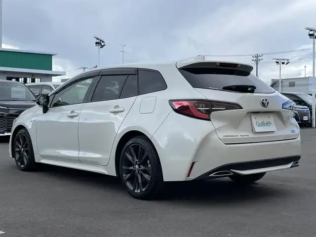 トヨタ カローラツーリング ハイブリッド ダブルバイビー 東京都 2019(令1)年 3.8万km ホワイトパールクリスタルシャイン 9インチディスプレイオーディオ/・バックカメラ/・フルセグテレビ/・Bluetooth/・スマートフォン連携（Apple CarPlay/Android Auto）/・AM/FM/ヘッドアップディスプレイ/トヨタセーフティーセンス/・プリクラッシュセーフティ/・レーントレーシングアシスト/・レーンディパーチャーアラート/・レーダークルーズコントロール（全車速追従機能）/ブラインドスポットモニター/純正フロアマット/ETC/スマートキー/プッシュスタート