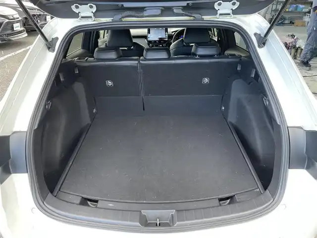 トヨタ カローラツーリング ハイブリッド ダブルバイビー 東京都 2019(令1)年 3.8万km ホワイトパールクリスタルシャイン 9インチディスプレイオーディオ/・バックカメラ/・フルセグテレビ/・Bluetooth/・スマートフォン連携（Apple CarPlay/Android Auto）/・AM/FM/ヘッドアップディスプレイ/トヨタセーフティーセンス/・プリクラッシュセーフティ/・レーントレーシングアシスト/・レーンディパーチャーアラート/・レーダークルーズコントロール（全車速追従機能）/ブラインドスポットモニター/純正フロアマット/ETC/スマートキー/プッシュスタート