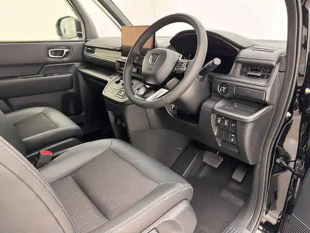 ホンダ ステップワゴン スパーダ eHEV 兵庫県 2025(令7)年 0.1千km クリスタルブラックパール ・登録済未使用車　/・純正メモリナビ　（LXM-247VFLi)/（CD/DVD/SD/Bluetooth/フルセグTV）　/・コーナーセンサー/・ＡＣＣ　/・ＬＫＡ/・ＰＣＳ/・ＢＳＭ　/・両側パワースライドドア　/・パワーバックドア　/・パドルシフト　/・シートヒーター/・ハーフレザーシート　/・ヘッドライトレベライザー/・ＬＥＤヘッドライト/・LEDフォグランプ/。スペアキー×１