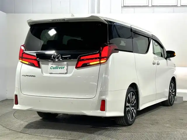 トヨタ アルファード S Cパッケージ 大阪府 2023(令5)年 1.4万km ホワイトパールクリスタルシャイン サンルーフ　黒革シート　三眼ＬＥＤ　純正ＤオーディオＴＶ　デジタルインナーミラー　パワーシート／ヒーター／エアコン　電動リアゲート　ハンドルヒーター　衝突軽減　レーダーＣ　ＢＳＭ　100V電源