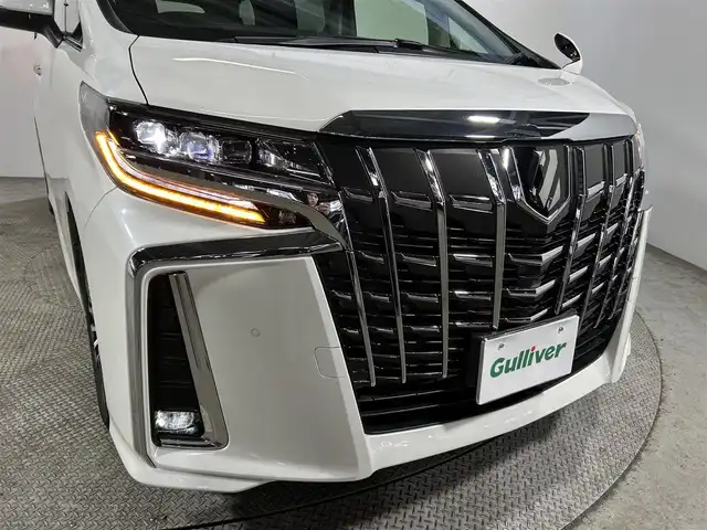 トヨタ アルファード S Cパッケージ 大阪府 2023(令5)年 1.4万km ホワイトパールクリスタルシャイン サンルーフ　黒革シート　三眼ＬＥＤ　純正ＤオーディオＴＶ　デジタルインナーミラー　パワーシート／ヒーター／エアコン　電動リアゲート　ハンドルヒーター　衝突軽減　レーダーＣ　ＢＳＭ　100V電源