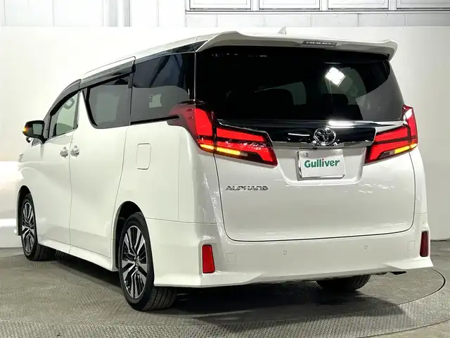 トヨタ アルファード S Cパッケージ 大阪府 2023(令5)年 1.4万km ホワイトパールクリスタルシャイン サンルーフ　黒革シート　三眼ＬＥＤ　純正ＤオーディオＴＶ　デジタルインナーミラー　パワーシート／ヒーター／エアコン　電動リアゲート　ハンドルヒーター　衝突軽減　レーダーＣ　ＢＳＭ　100V電源