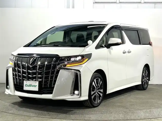 トヨタ アルファード S Cパッケージ 大阪府 2023(令5)年 1.4万km ホワイトパールクリスタルシャイン サンルーフ　黒革シート　三眼ＬＥＤ　純正ＤオーディオＴＶ　デジタルインナーミラー　パワーシート／ヒーター／エアコン　電動リアゲート　ハンドルヒーター　衝突軽減　レーダーＣ　ＢＳＭ　100V電源
