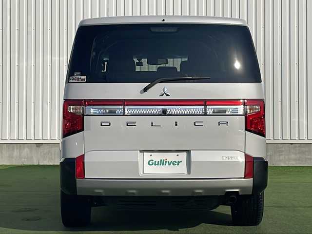 三菱 デリカＤ：５ ジャスパー 香川県 2023(令5)年 1.5万km ホワイトダイヤモントド/グラファイトグレーメタリック 三菱e-Assist/・衝突軽減ブレーキ/・車線逸脱警報/・アダプティブクルーズコントロール/・オートハイビームアシスト/・ブラインドスポットモニター/純正10.1型ナビ/【CD.DVD.USB.SD.BT】/フルセグTV/全方位カメラ　/リラックスルームイルミネーション/両側電動スライド　/パワーバックドア/パワーシート　/シートヒーター　/ハーフレザーシート/ハンドルヒーター　/パドルシフト　/革巻きステアリング　/ＬＥＤライト　/ＬＥＤフォグライト/電動パーキングブレーキ/オートホールド/ドライブレコーダー　/ETC/シートカバー/電動パーキングブレーキ