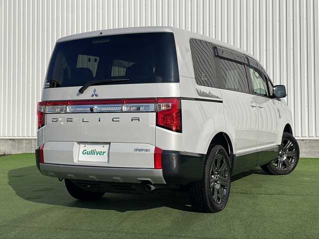 三菱 デリカＤ：５ ジャスパー 香川県 2023(令5)年 1.5万km ホワイトダイヤモントド/グラファイトグレーメタリック 三菱e-Assist/・衝突軽減ブレーキ/・車線逸脱警報/・アダプティブクルーズコントロール/・オートハイビームアシスト/・ブラインドスポットモニター/純正10.1型ナビ/【CD.DVD.USB.SD.BT】/フルセグTV/全方位カメラ　/リラックスルームイルミネーション/両側電動スライド　/パワーバックドア/パワーシート　/シートヒーター　/ハーフレザーシート/ハンドルヒーター　/パドルシフト　/革巻きステアリング　/ＬＥＤライト　/ＬＥＤフォグライト/電動パーキングブレーキ/オートホールド/ドライブレコーダー　/ETC/シートカバー/電動パーキングブレーキ