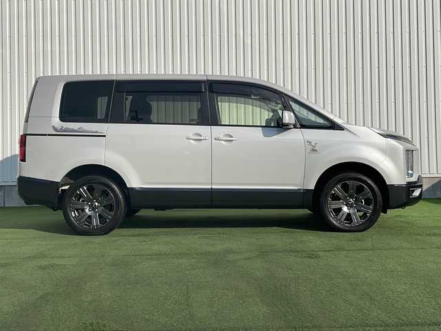 三菱 デリカＤ：５ ジャスパー 香川県 2023(令5)年 1.5万km ホワイトダイヤモントド/グラファイトグレーメタリック 三菱e-Assist/・衝突軽減ブレーキ/・車線逸脱警報/・アダプティブクルーズコントロール/・オートハイビームアシスト/・ブラインドスポットモニター/純正10.1型ナビ/【CD.DVD.USB.SD.BT】/フルセグTV/全方位カメラ　/リラックスルームイルミネーション/両側電動スライド　/パワーバックドア/パワーシート　/シートヒーター　/ハーフレザーシート/ハンドルヒーター　/パドルシフト　/革巻きステアリング　/ＬＥＤライト　/ＬＥＤフォグライト/電動パーキングブレーキ/オートホールド/ドライブレコーダー　/ETC/シートカバー/電動パーキングブレーキ