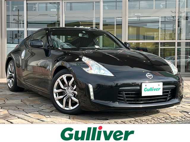 日産 フェアレディ Ｚ 静岡県 2013(平25)年 6.4万km ダイヤモンドブラック 純正メモリナビ/・CD/・DVD/・フルセグＴＶ/・Bluetooth/・AM/・FM/主要装備/・横滑り防止装置/・パドルシフト/・バックカメラ/・ETC/・ステリモ/・純正フロアマット/・純正アルミホイール/・キセノンヘッドライト/・オートライト/スマートキー/・プッシュスタート