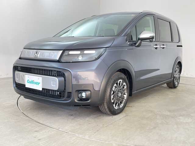 ホンダ フリード ハイブリット e:HEV クロスター 兵庫県 2025(令7)年 0.1千km メテオロイドグレーメタリック ・登録済未使用車/・純正9インチナビ/・フルセグ・BT・USB・Apple Car Play/・バックカメラ/・両側パワースライドドア/・衝突軽減ブレーキ/・路外逸脱抑制機能/・踏み間違い衝突軽減システム/・パーキングセンサー/・先行車発進お知らせ/・レーンキープアシスト/・ブラインドスポットモニター/・標識認識機能/・アダプティブクルーズコントロール/・ハーフレザー/・前席シートヒーター/・2列目サンシェード/・3列目サーキュレーター/・LEDヘッドライト/・フォグランプ/・オートライト/・オートマチックハイビーム/・プッシュスタート/・スマートキー/・スペアキー